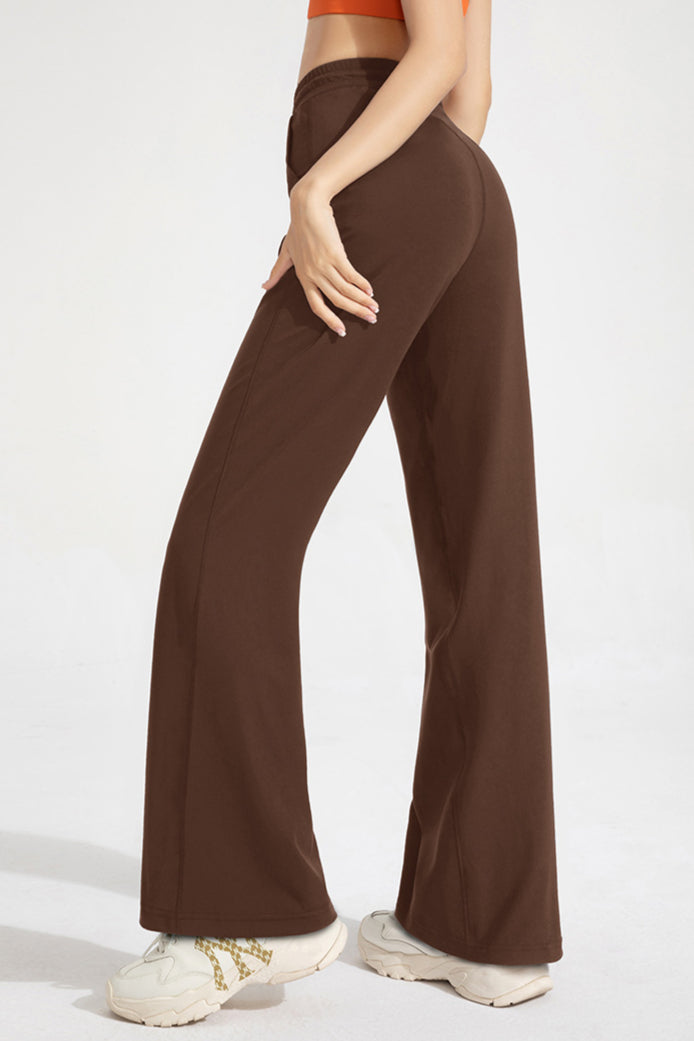 Pantaloni classici a zampa con coulisse da donna