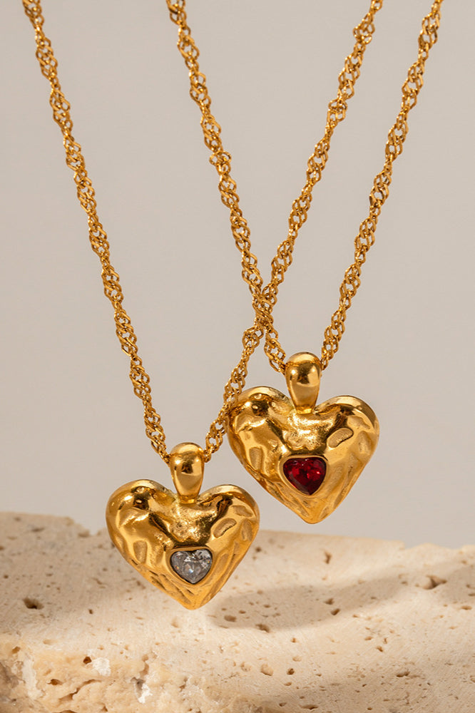 Collana con ciondolo a cuore in oro e pietra preziosa