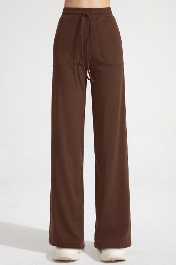 Pantaloni classici a zampa con coulisse da donna