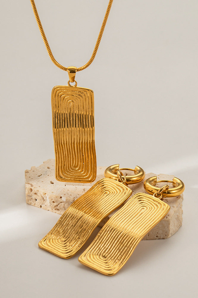 Collana geometrica contemporanea in oro