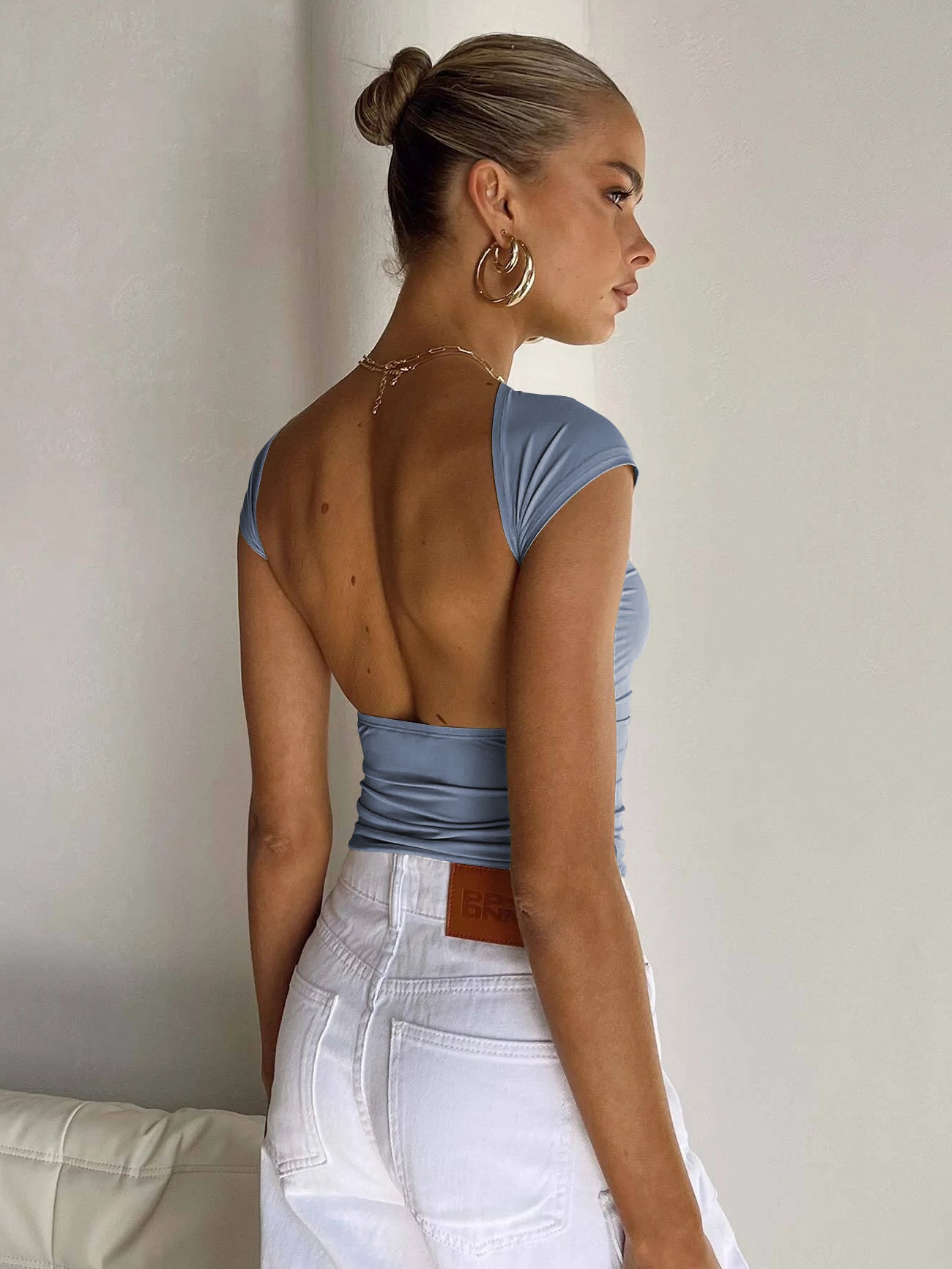Top corto traspirante aderente con schiena scoperta sexy blu