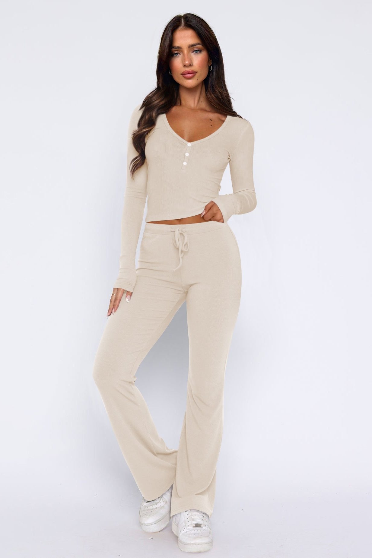 Completo casual con top a maniche lunghe e pantaloni svasati