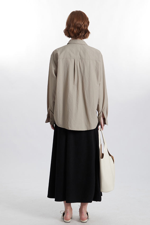 Camicia da donna oversize con bottoni beige