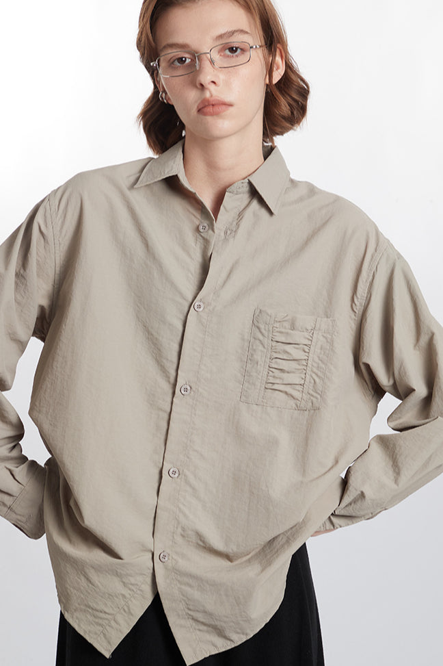 Camicia da donna oversize con bottoni beige