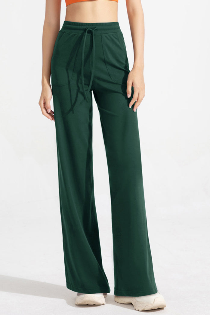 Pantaloni classici a zampa con coulisse da donna