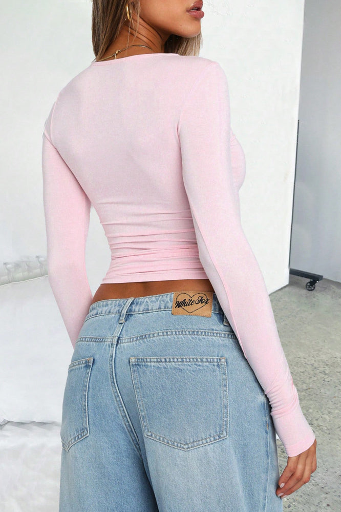 Crop top donna a maniche lunghe con stelle leopardate