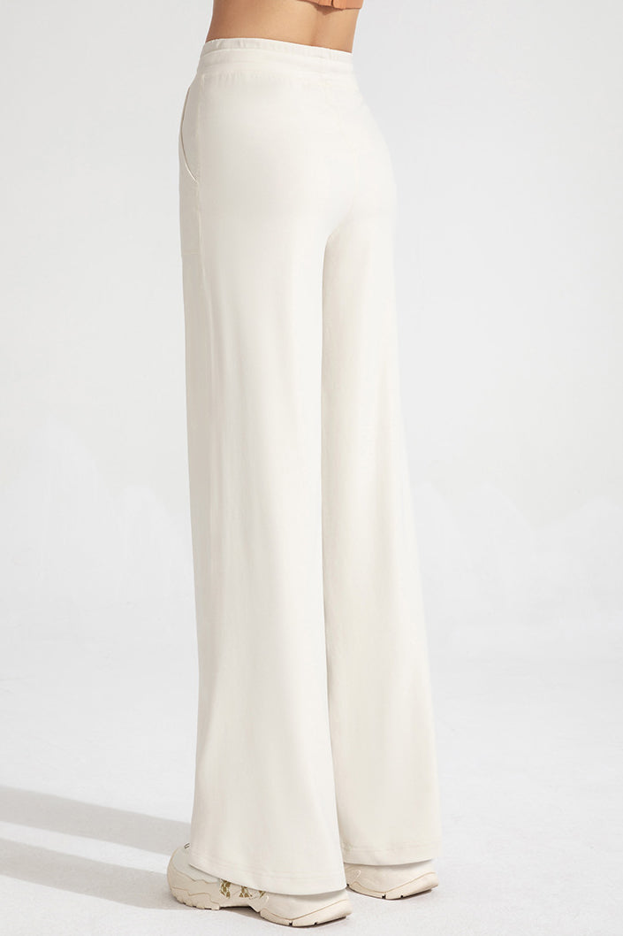 Pantaloni classici a zampa con coulisse da donna