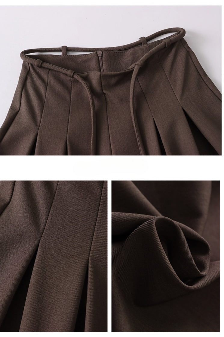 Lussuosi pantaloni a vita alta e gamba larga