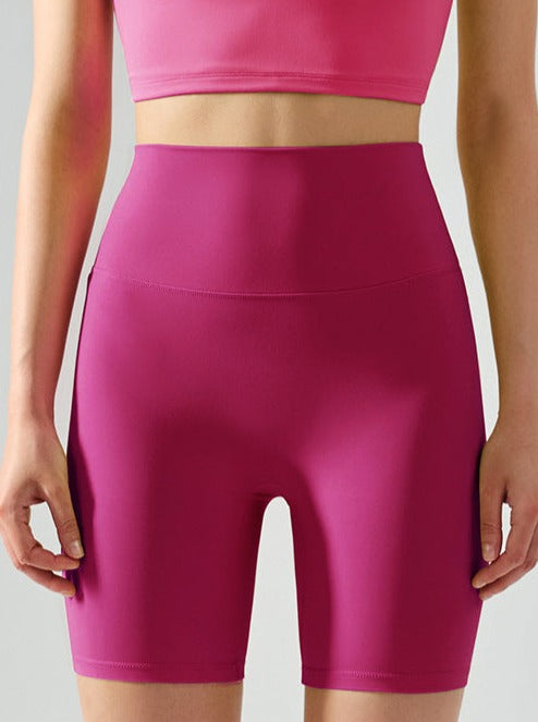 Pantaloncini fitness senza cuciture elastici a vita alta da yoga in tinta unita 