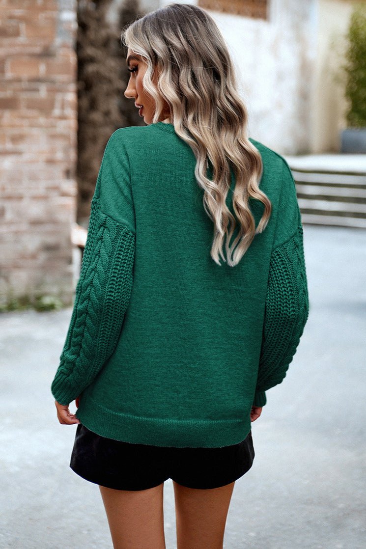 Maglione verde a maniche lunghe con scollo tondo 